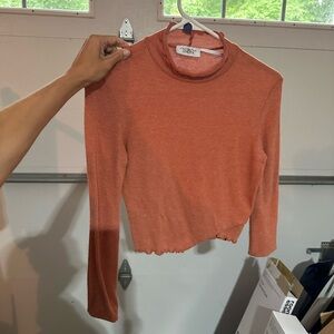 Orange mock neck cropped long sleeve